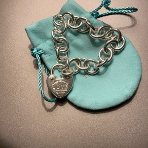 Tiffany love lock bracelet.  Silver